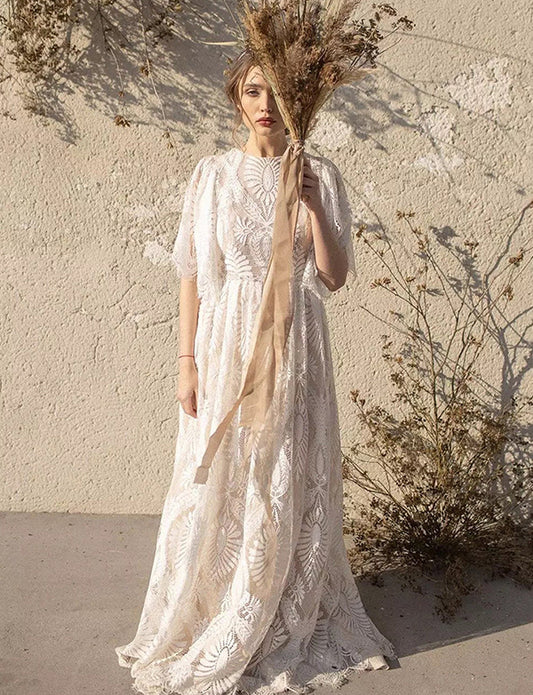 Robe de mariée boho en dentelle avec manches