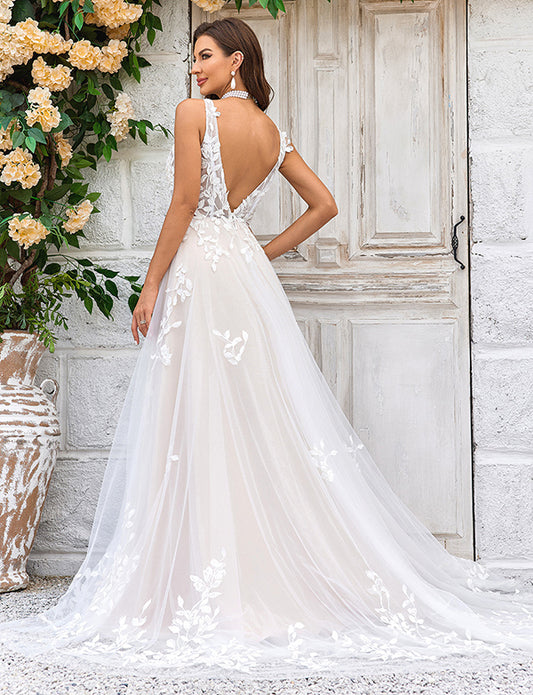 Magnifique robe de mariée en tulle champagne à encolure en V profonde et dentelle