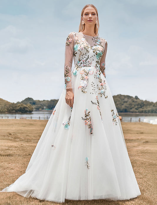 Magnifique robe de mariée ivoire à manches longues en tulle avec broderie