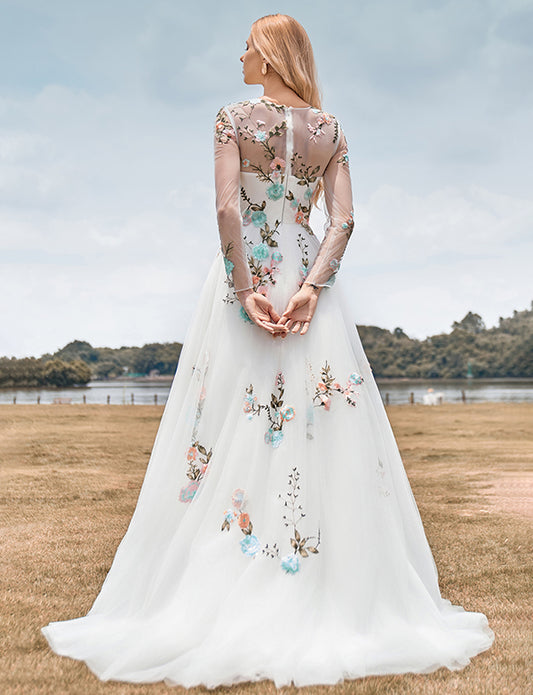 Magnifique robe de mariée ivoire à manches longues en tulle avec broderie