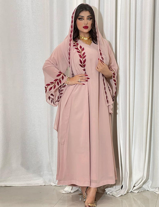Robe longue musulmane en mousseline brodée rose à col rond