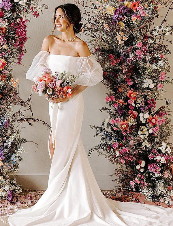Robe de mariée fourreau avec manches bouffantes