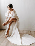 Robe de mariée fourreau avec manches bouffantes