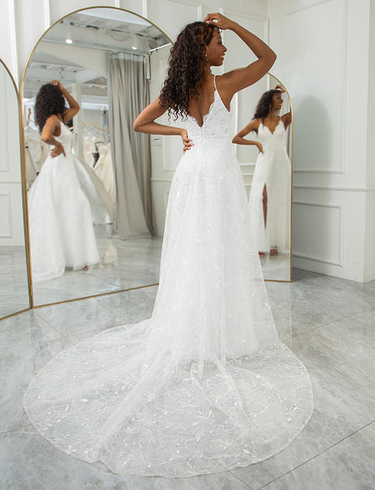 Robe de mariée ivoire à col en V et dentelle appliquée