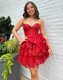 Robe de bal rouge en forme de A à épaules dénudées avec nœud papillon