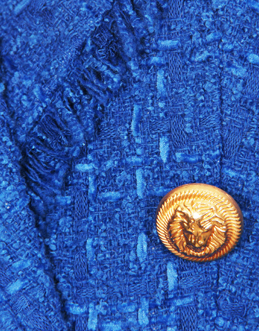 Veste pour femmes double-breasted avec revers en pointillé bleu royal et glands