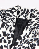 Veste de femme à revers pointus, à une boucle unique, avec motif de léopard noir et blanc