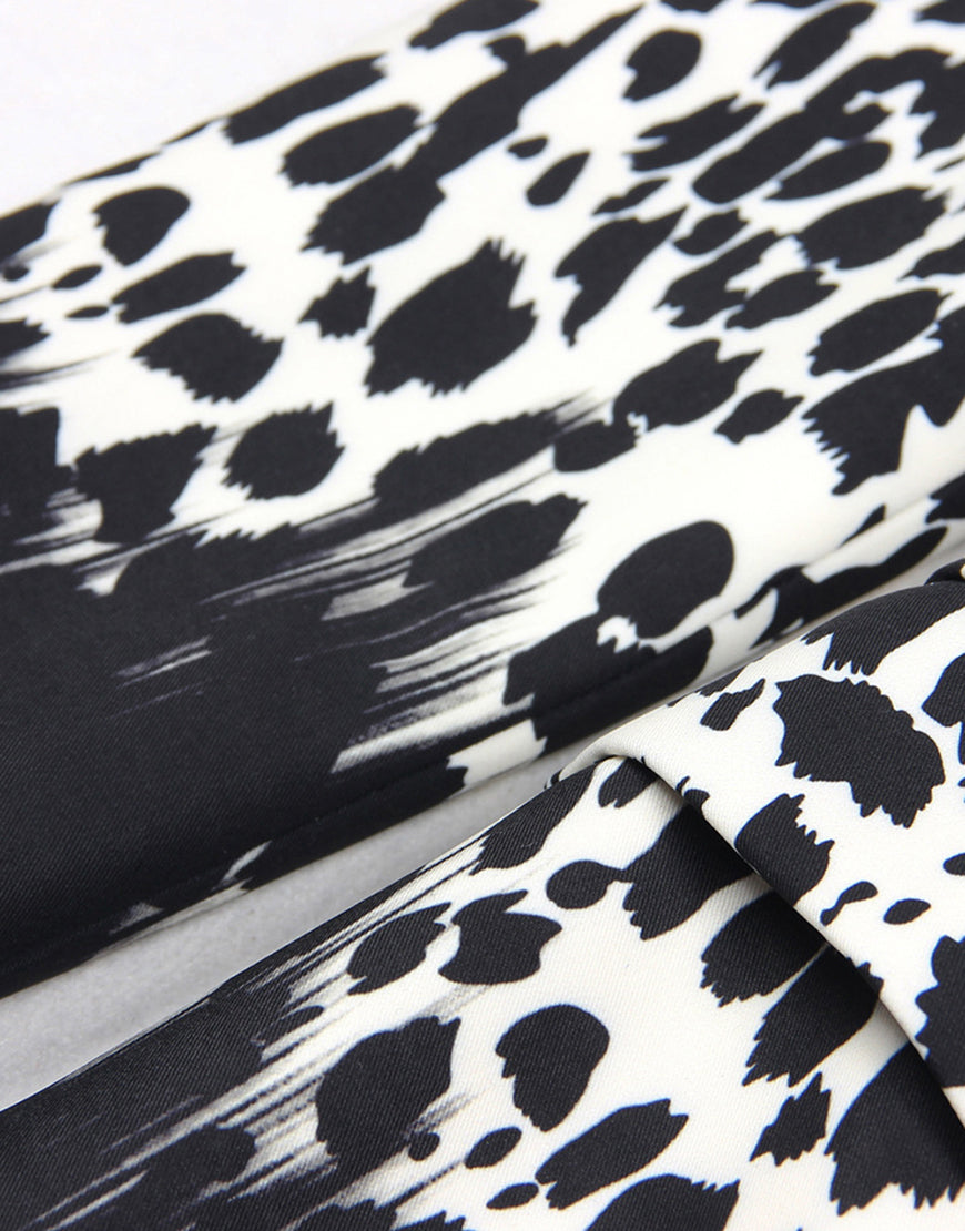 Veste de femme à revers pointus, à une boucle unique, avec motif de léopard noir et blanc