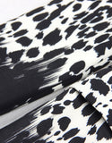 Veste de femme à revers pointus, à une boucle unique, avec motif de léopard noir et blanc