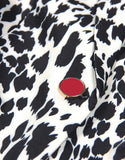 Veste de femme à revers pointus, à une boucle unique, avec motif de léopard noir et blanc