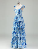Robe de bal bleue en ligne A, avec un décolleté en poche et des volants en cascade