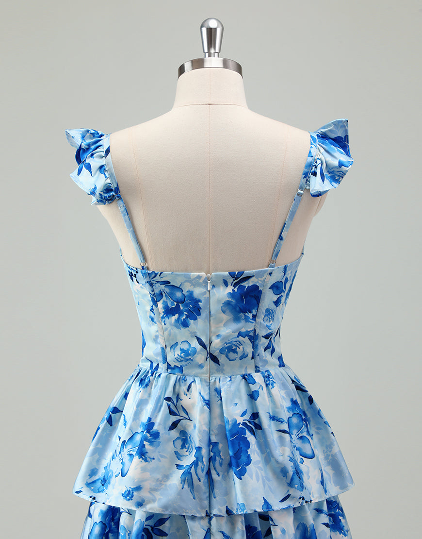 Robe de bal bleue en ligne A, avec un décolleté en poche et des volants en cascade