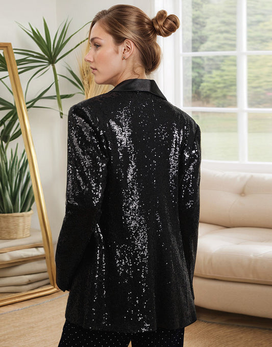 Veste femme avec revers en losanges noirs en paillettes et franges