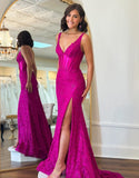 Robe de bal fourreau fuchsia à dos nu avec fente