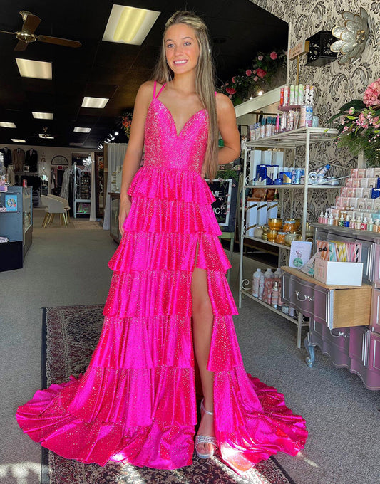 Robe de bal longue à volants et fente en tulle fuchsia pailleté