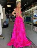 Robe de bal longue à volants et fente en tulle fuchsia pailleté