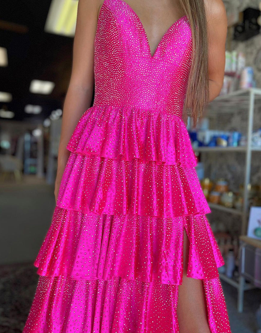 Robe de bal longue à volants et fente en tulle fuchsia pailleté