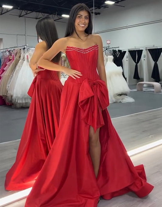 Robe de bal trapèze à col bateau et nœud avec fente