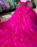Robe de bal en tulle fuchsia à appliques spaghetti et nœud
