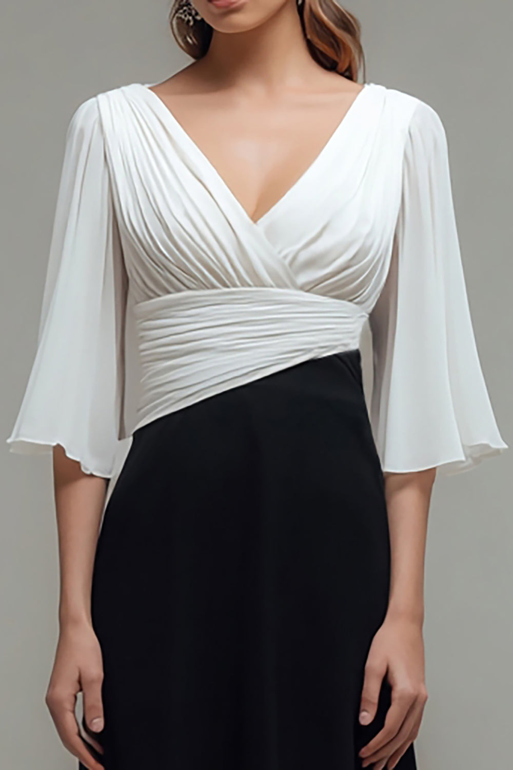 Robe longue formelle trapèze noire et blanche à col en V avec manches flottantes
