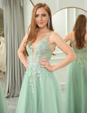 Robe longue de soirée en tulle avec appliques