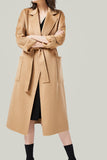 Manteau de laine ceinturé à revers noir avec poches