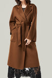 Manteau de laine ceinturé à revers noir avec poches