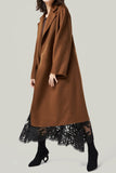 Manteau de laine ceinturé à revers noir avec poches