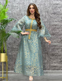 Robes caftan avec feuilles d'or et strass