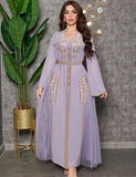 Robe caftan perlée de diamants