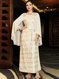 Robe beige à paillettes et strass