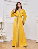 Robe jaune fendue