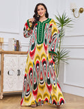 Robe en laine imprimée, dentelle et strass