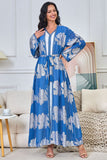 Robe caftan bleue à imprimé floral et col en V