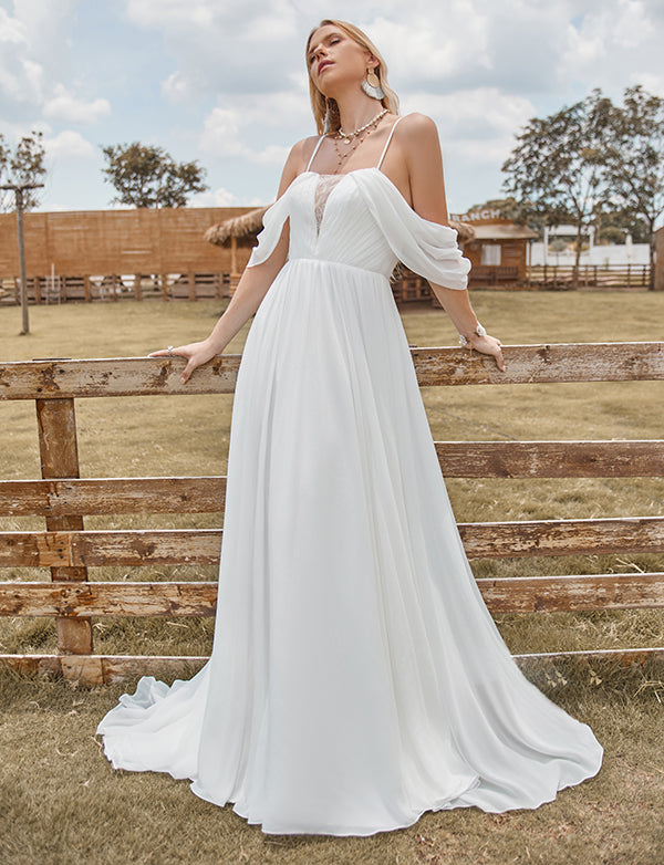 Robe de mariée brodée en mousseline de soie ivoire, à épaules dénudées