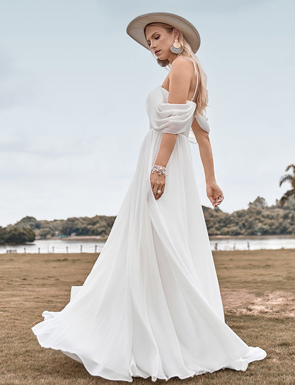 Robe de mariée brodée en mousseline de soie ivoire, à épaules dénudées