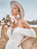 Robe de mariée brodée en mousseline de soie ivoire, à épaules dénudées