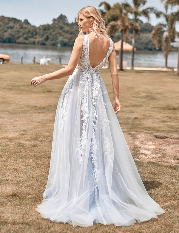 Robe de mariée ligne A en tulle ivoire avec applications