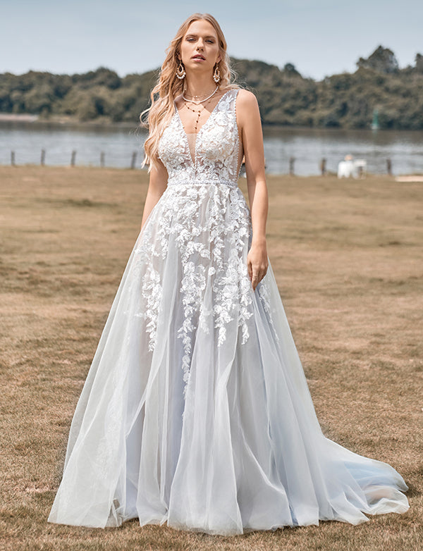 Robe de mariée ligne A en tulle ivoire avec applications