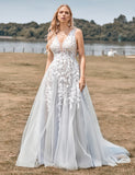 Robe de mariée ligne A en tulle ivoire avec applications