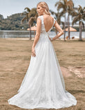 Robe de mariée longue ligne A en tulle perlé ivoire scintillant