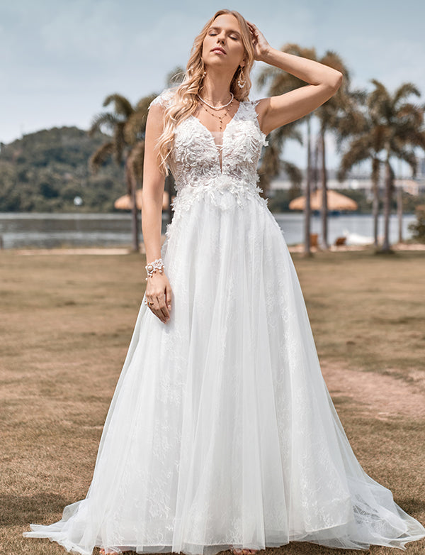 Robe de mariée longue ligne A en tulle perlé ivoire scintillant