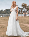 Robe de mariée longue ligne A en tulle perlé ivoire scintillant