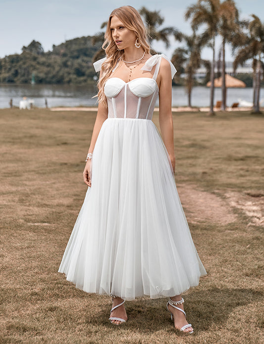 Robe de mariée en tulle ivoire avec corset