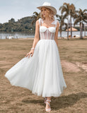 Robe de mariée en tulle ivoire avec corset