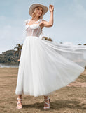 Robe de mariée en tulle ivoire avec corset