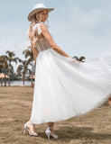 Robe de mariée en tulle ivoire avec corset