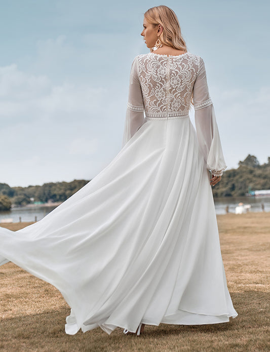 Robe de mariée ivoire à manches longues avec dentelle