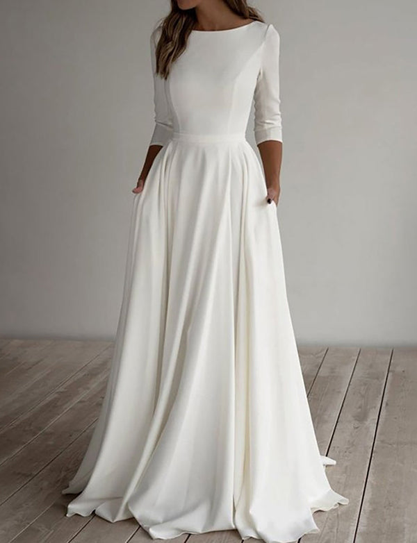 Robe de mariée longue à manches 3/4 de couleur blanche