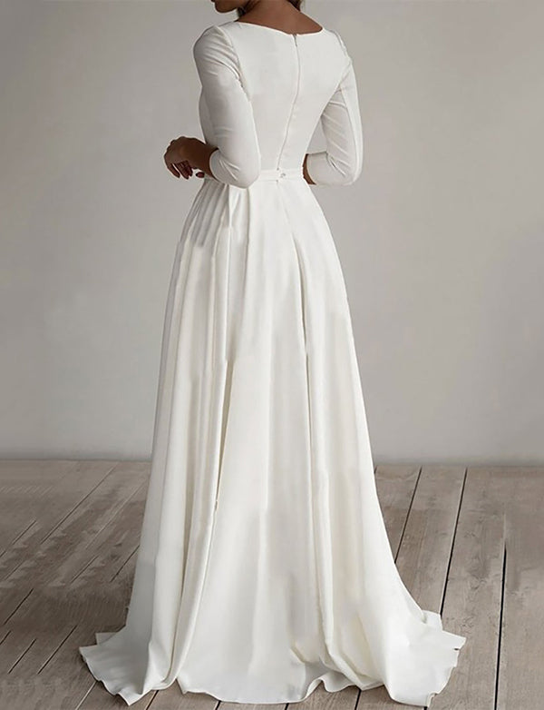 Robe de mariée longue à manches 3/4 de couleur blanche